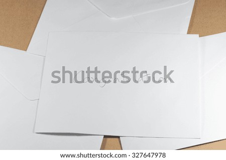 wording Congratulation of white envelope on brown background