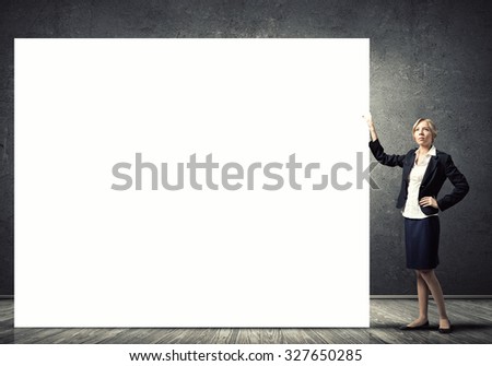 Fullbody of blond businesswoman with white blank banner