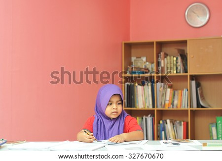 young girl studying 