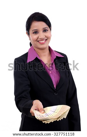 Young business woman holding five hundred rupee notes 