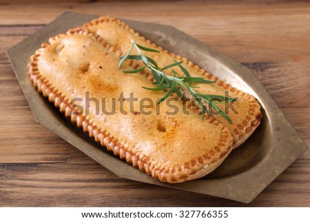 typical portuguese appetizers on dish on brown background