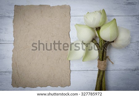 Blank brown paper with white lotus flower
