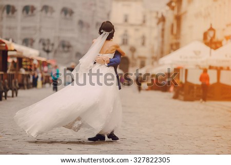 beautiful young couple in wedding sunny summer day