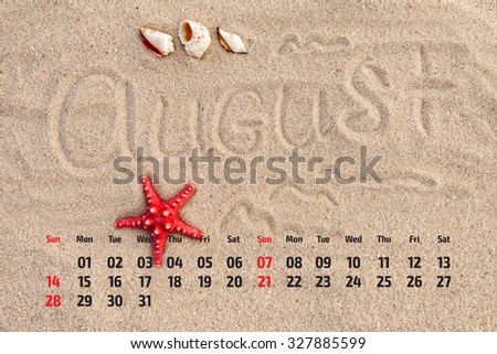 Photo calendar with starfish and seashells on sand beach. August  2016