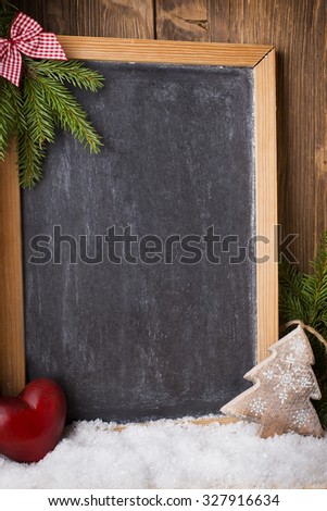 Christmas background blackboard with festive decor.
