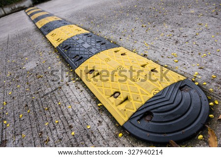 Washboard road, yellow caution