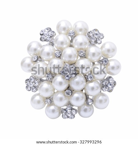 round brooch with pearls isolated on white Royalty-Free Stock Photo #327993296