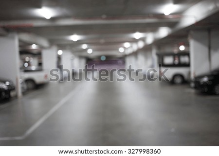Blur image, Underground parking with cars.