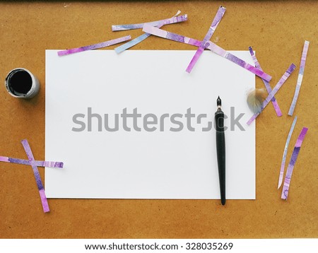 artist and paint mockup with white paper on wooden background, brushes, paint and watercolor