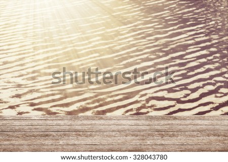 wooden table at the summer background.