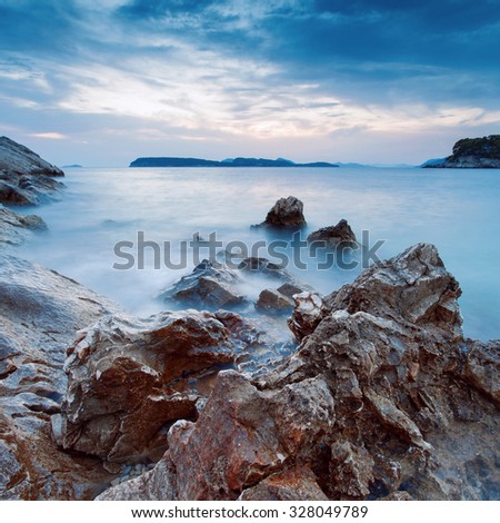 Beautiful seascape. Seascape with a slow shutter speed in the setting time.