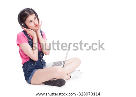 Young asian woman using a computer on white background