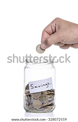 Photo taken money fell into the jar.