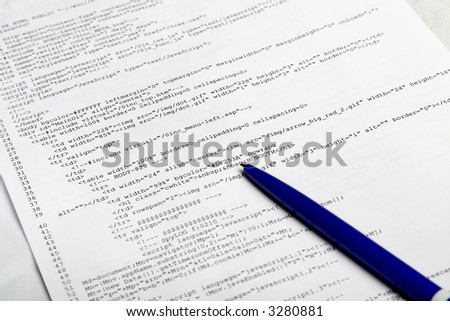 Photo of document with web code and pen