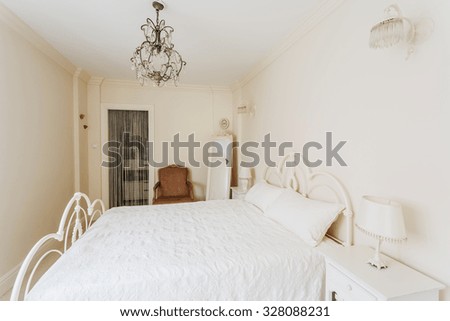 Picture of king size bed with iron decorative details
