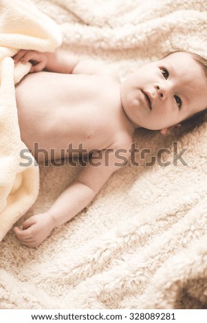 Picture of calm beautiful baby cover with soft blanket