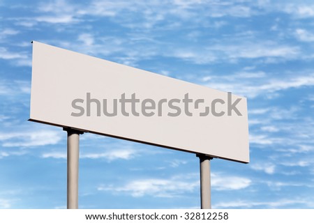 Blank road sign without frame against sky
