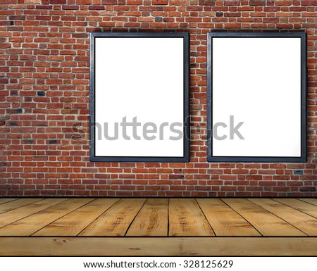 Two big blank billboard attached to a brick wall inside with wooden floor
