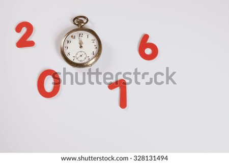 Year 2016, pocket watch, 12 o'clock, white background, copy space