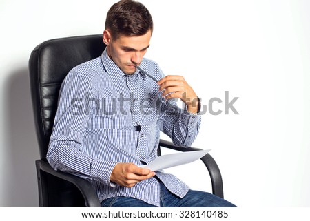 Business man hold the paper and marker at the office on white background