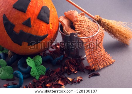 Halloween pumpkin with plasticine details.