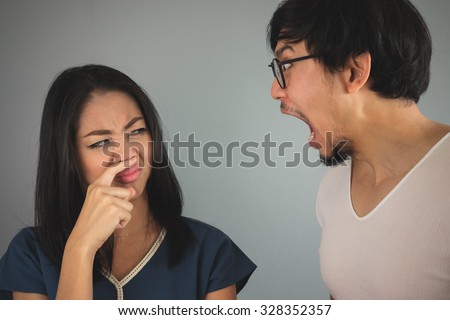 Bad breath from the husband. Royalty-Free Stock Photo #328352357