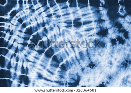 tie dyed pattern on cotton fabric for background. 