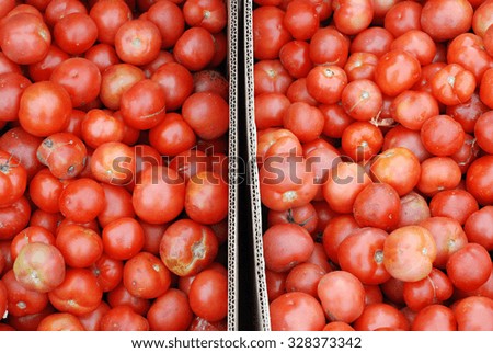 picture of a fresh tomatoes for sale on a market