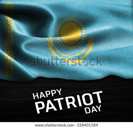 Happy Patriot Day Kazakhstan flag on wood Texture background