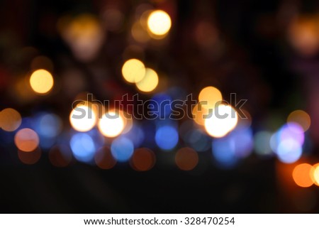 Abstract background with bokeh defocused lights and shadow.