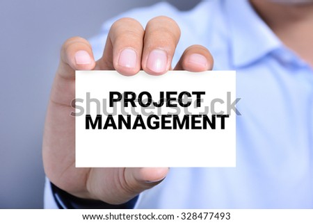 PROJECT MANAGEMENT, message on the card shown by a man