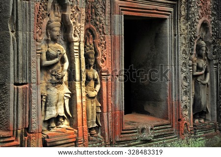 Photo from Angkor Wat world heritage site, Apsara Carvings at Ta Prohm wall Angkor Wat area, Cambodia Apsaras are beautiful women youthful, elegant and proficient in the art of dancing