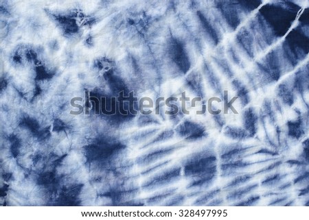 tie dyed pattern on cotton fabric for background.


