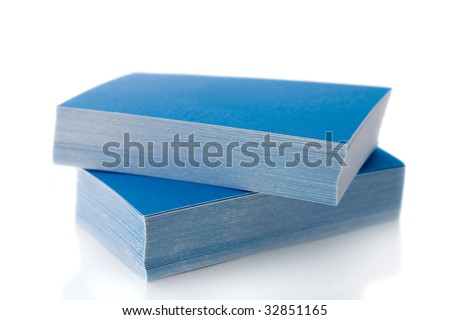 Pile of blue business cards, isolated on white background, with shadow
