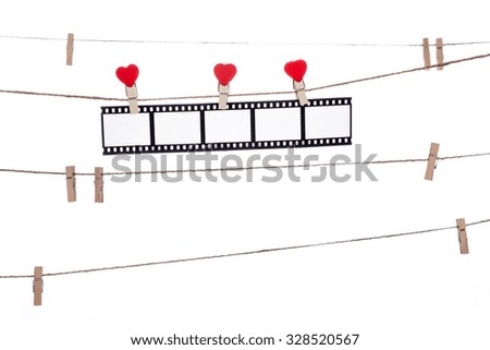 heart  shape clip on a clothesline , hanging Negatives, love movie memory