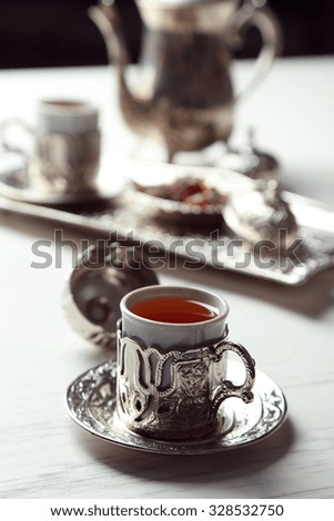 Antique tea-set on table close-up