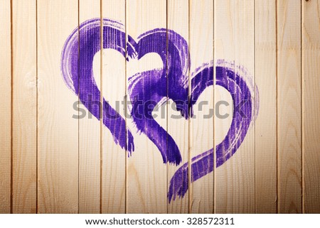 Hearts painted on wooden wall