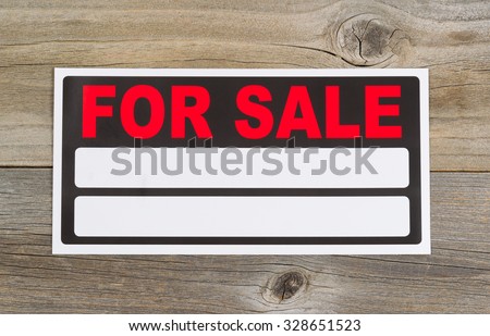 New for sale sign, ready for use, on rustic wood 