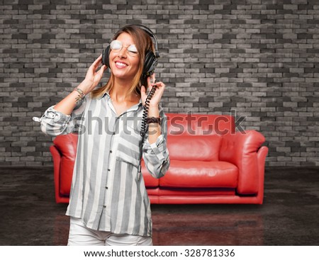 young woman dancing with headphones