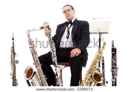 A man playing his wind instrument with expression.