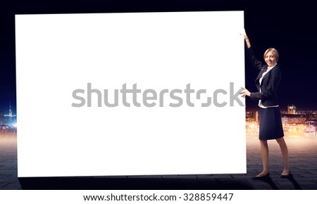 Fullbody of blond businesswoman with white blank banner
