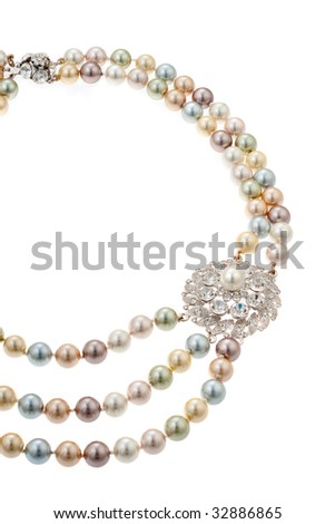 Necklace with a brooch on white background
