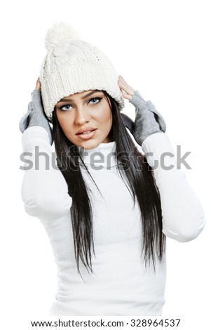 Beautiful brunette girl model in winter clothes