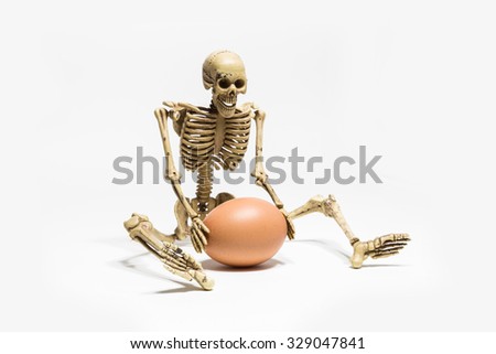 Still life with skull and death and egg advent