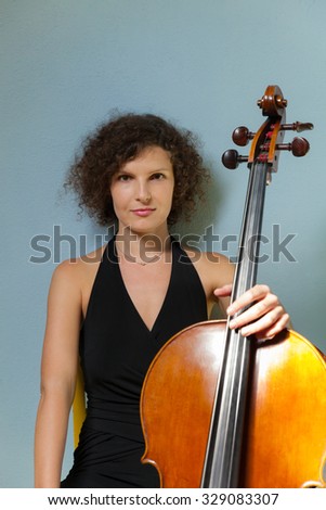 portrait of young woman with her cello