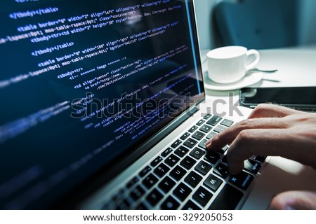 Programming Work Time. Programmer Typing New Lines of HTML Code. Laptop and Hand Closeup. Working Time. Web Design Business Concept. Royalty-Free Stock Photo #329205053