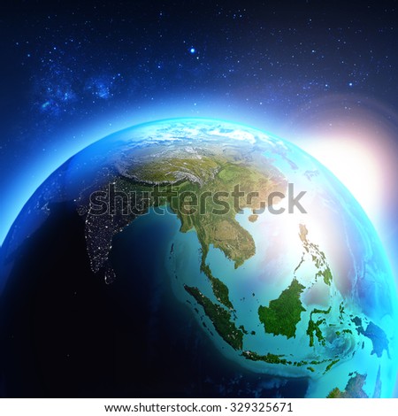 Asia seen from space / Elements of this image furnished by NASA. Royalty-Free Stock Photo #329325671