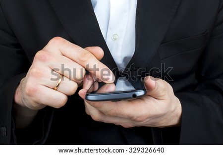 businessman using a smartphone with background