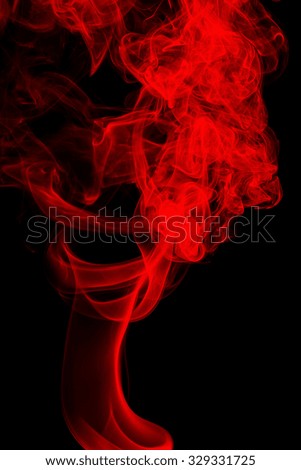 red smoke on a black background.