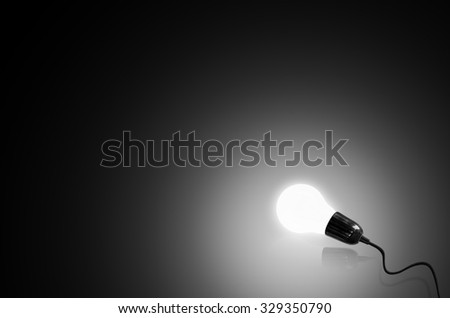 Light bulb on black background, Concept think ideas.